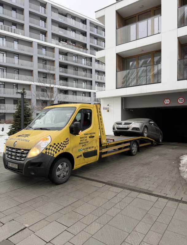 Transport auta Warszawa — Volkswagen z parkingu podziemnego, 506-001-057